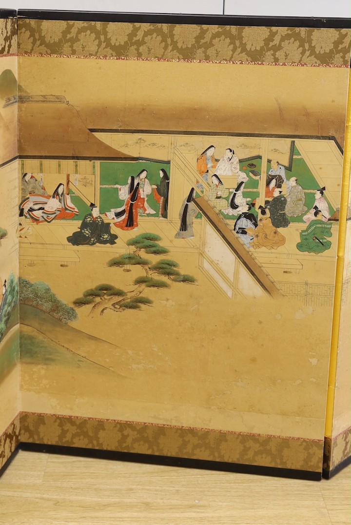 A 19th century Japanese four-leaf painted screen, later remounted, 216cm long